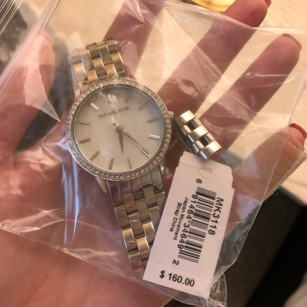 Michael Kors model MK3118 in silver. Brand new.